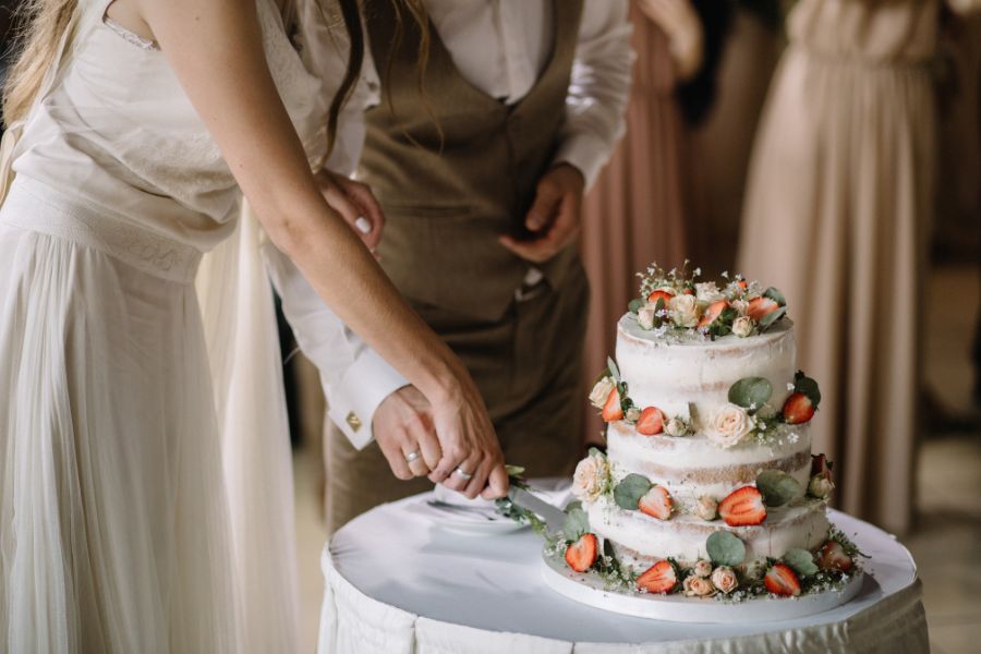 Bride and Groom cutting their wedding cake